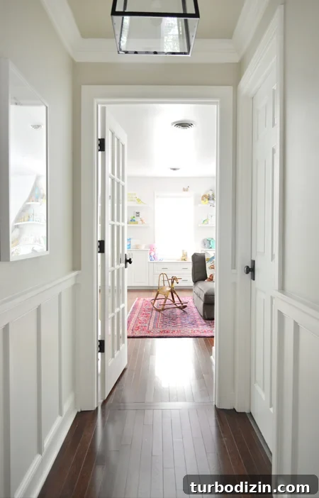 How We Transformed Our Bonus Room Into a Stylish Lounge 4 Playful-Family-Bonus-Room-From-Hallway