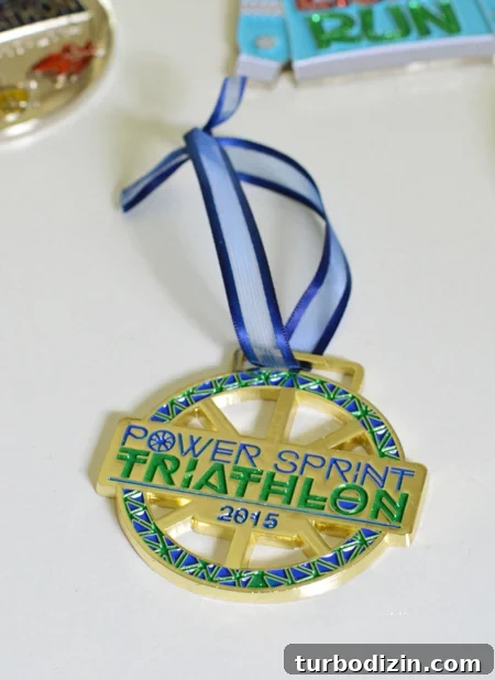 Turn Race Medals Into Unique Christmas Ornaments 6 triathlon race medal with shorter ribbon to be hung on christmas tree