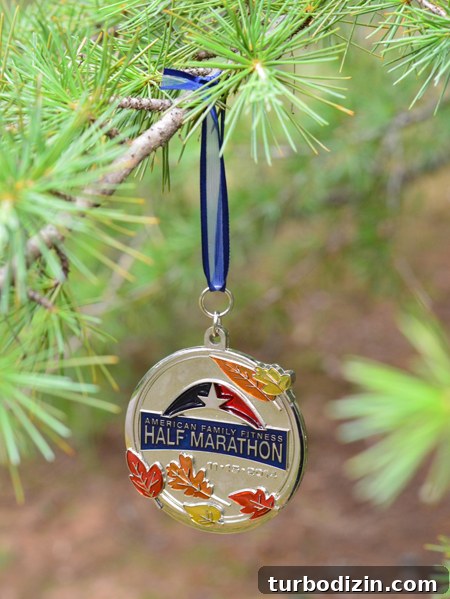 Turn Race Medals Into Unique Christmas Ornaments 7 half marathon running race medal hung on christmas tree