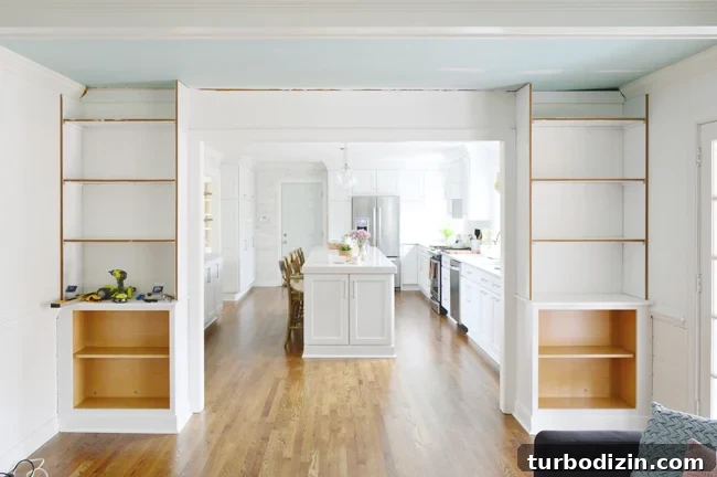 How to Build Custom Built-In Bookshelves for Your Home 14 Two Side Bookshelves Constructed Next To Doorway