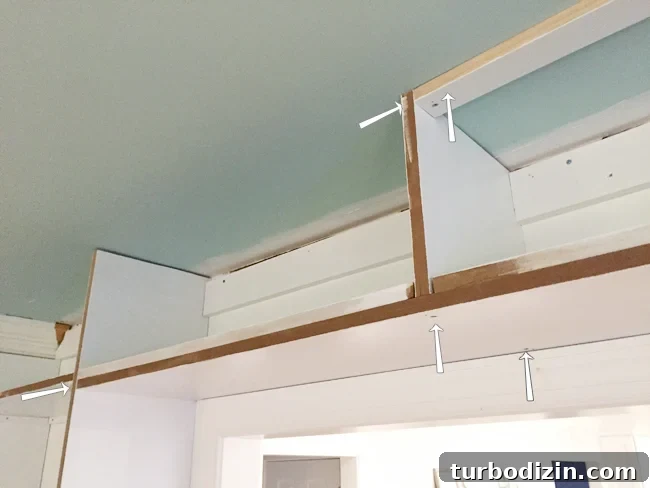 How to Build Custom Built-In Bookshelves for Your Home 16 Detail of Attaching Built-In Bookshelf across doorway