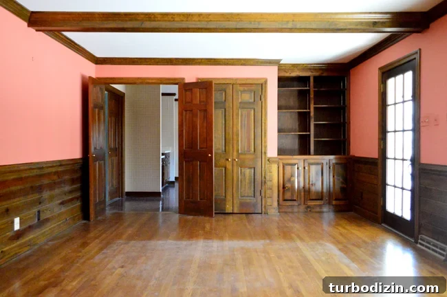 How to Build Custom Built-In Bookshelves for Your Home 3 built-in bookshelf in wood paneling living room
