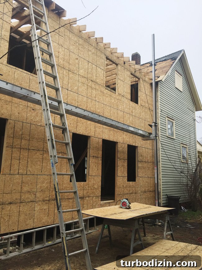 Beach House Renovation: Stripping to the Studs Guide 16 Rebuilt exterior and siding progress