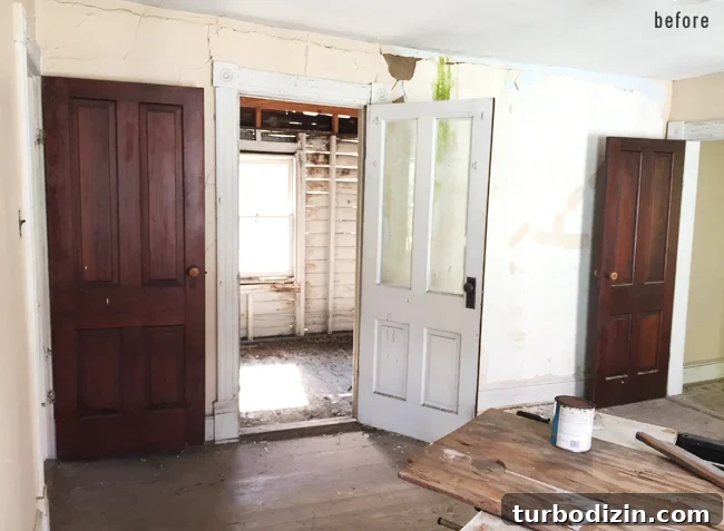 Beach House Renovation: Stripping to the Studs Guide 18 Before view from middle bedroom toward old porch