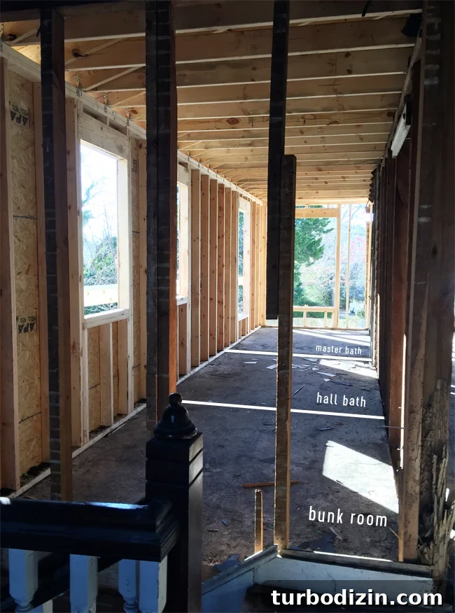 Beach House Renovation: Stripping to the Studs Guide 20 Rebuilt portion of house viewed from stairs