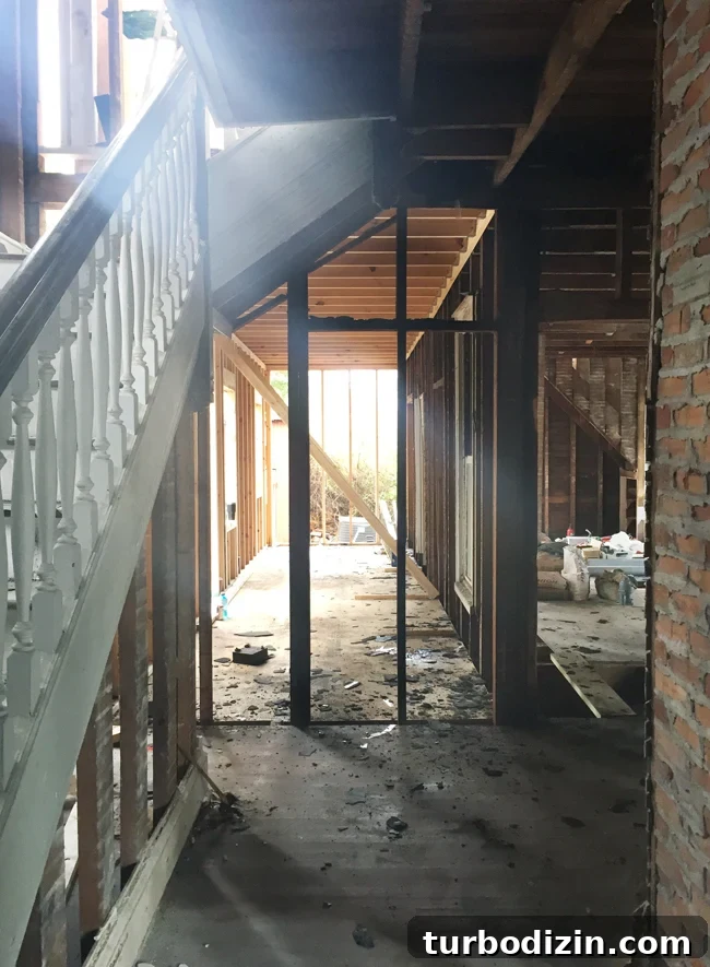 Beach House Renovation: Stripping to the Studs Guide 21 Downstairs foyer view after reconstruction