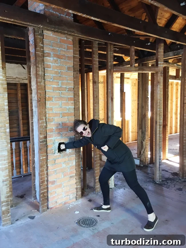 Beach House Renovation: Stripping to the Studs Guide 6 Exposed brick chimney discovered