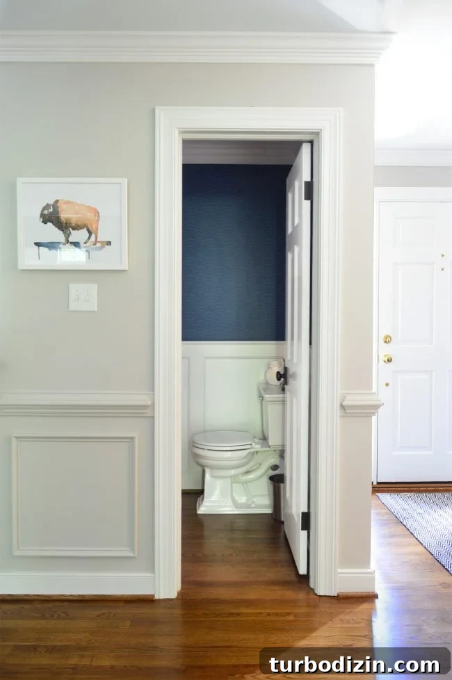 Family-Friendly Whole-House Renovation Guide for Comfortable Living 14 Powder room with wallpaper