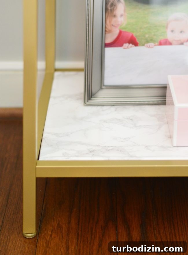 ikea metal shelf hack with gold spray paint marble contact paper