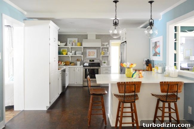 P-shaped kitchen opening to dining room