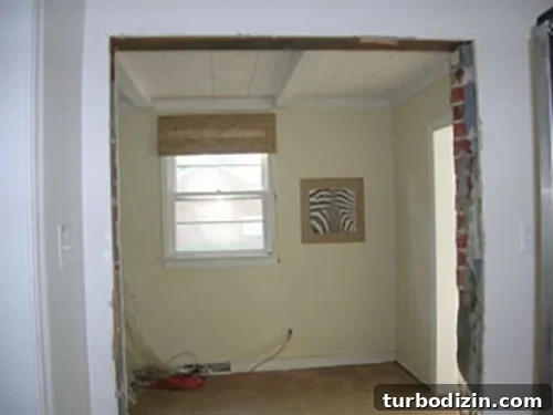 How to Widen a Brick Doorway: Hiring a Mason Guide 2 Widened brick doorway from kitchen to den