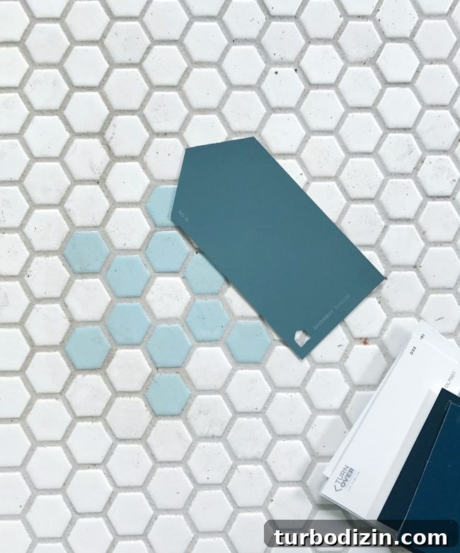Paint swatch on blue tile hex floor