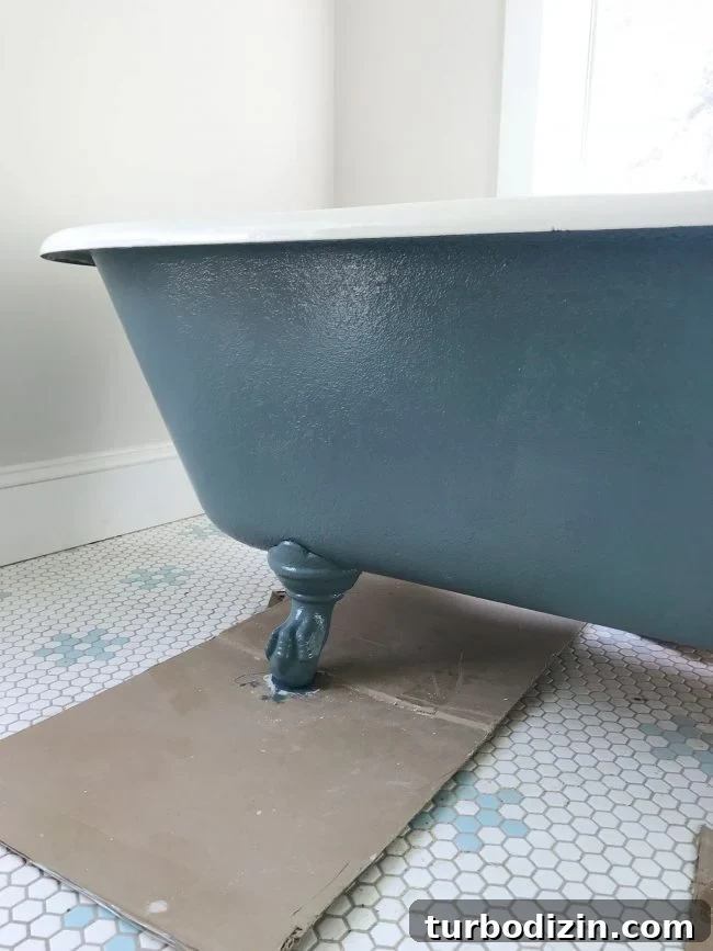 Painted outside surface of refinished vintage clawfoot tub