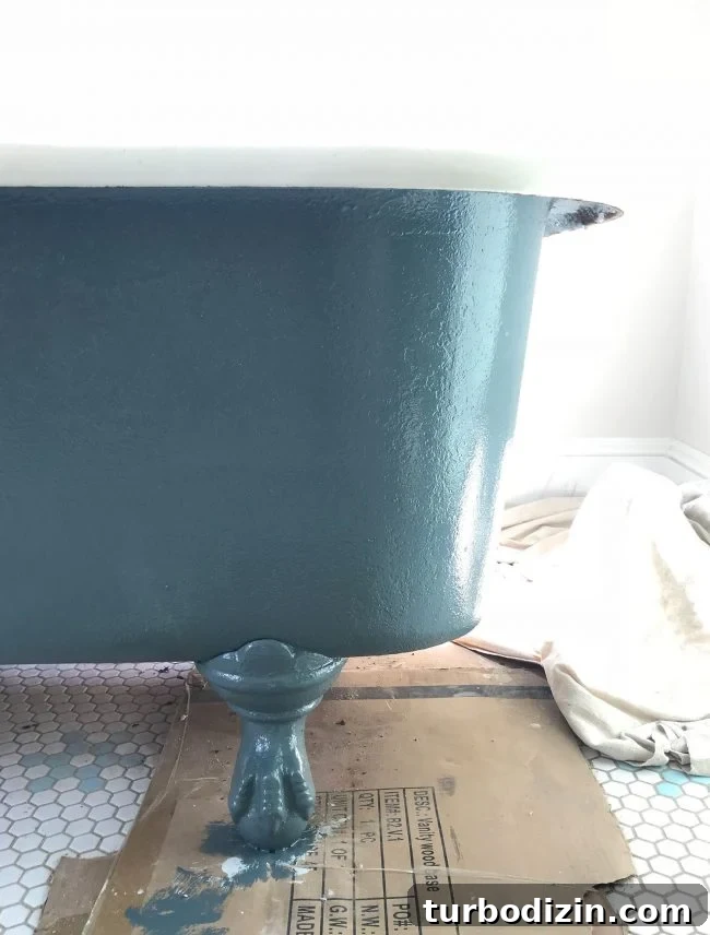 Navy blue painted refinished clawfoot tub