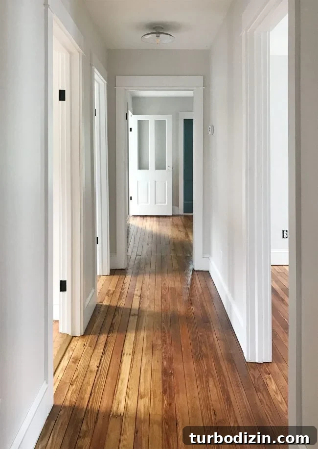 Heart Pine Floor Refinishing: Before and After Transformations 11 clear sealed pine floors in upstairs hallway