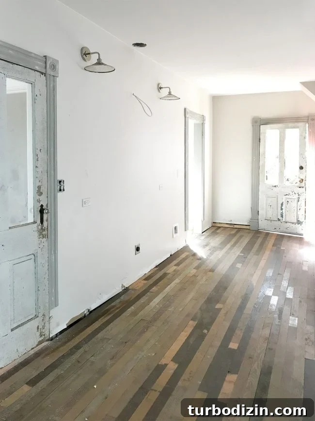Heart Pine Floor Refinishing: Before and After Transformations 5 patched pine flooring before sanding