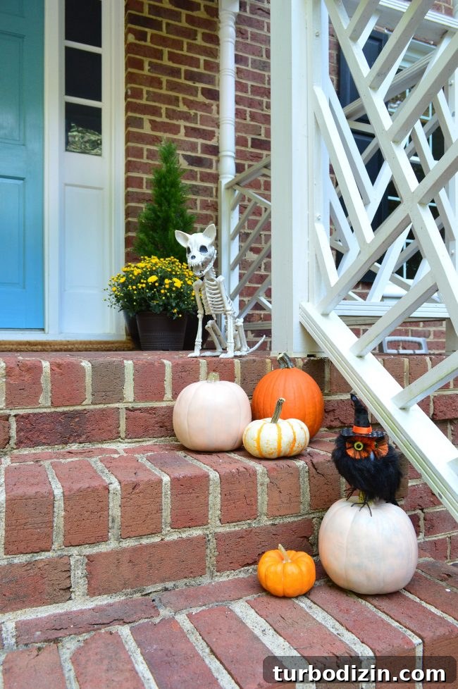 3 Quick Front Porch Updates to Boost Curb Appeal 13 Halloween Front Porch Decor Pumpkins Skeleton Owl