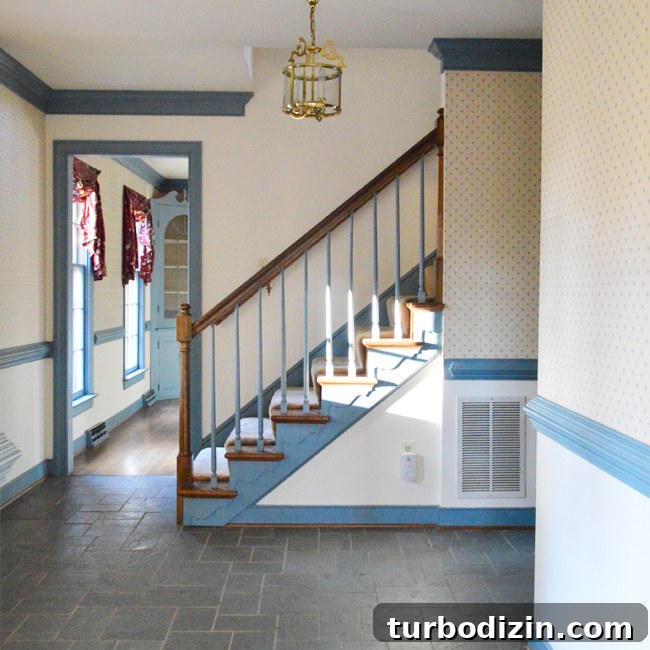Foyer Refresh: New Lighting and Furniture Ideas to Transform Your Entryway 3 HouseTour-Before-Stairs