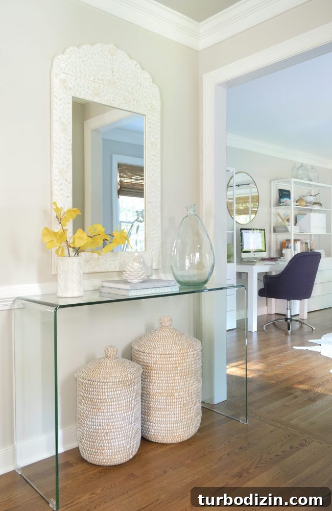 Foyer Refresh: New Lighting and Furniture Ideas to Transform Your Entryway 6 neutral foyer gingko leaf basket mirror