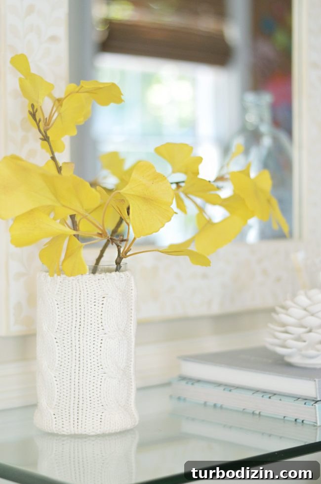 Foyer Refresh: New Lighting and Furniture Ideas to Transform Your Entryway 8 faux gingko leaf branch decor in vase