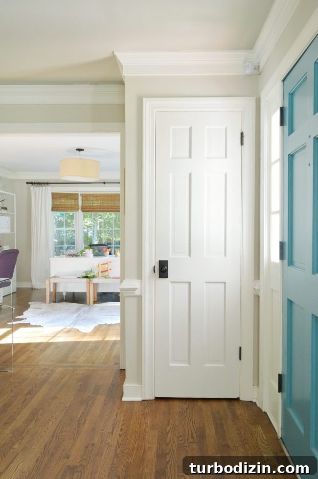 Foyer Refresh: New Lighting and Furniture Ideas to Transform Your Entryway 9 neutral foyer game closet door closed
