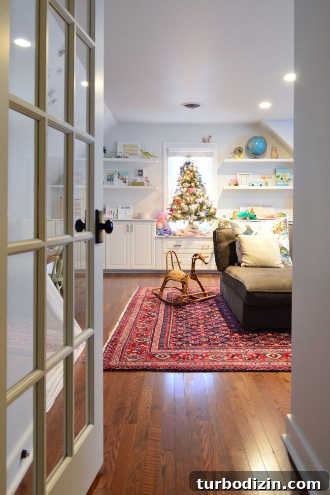 Holiday Home Tour: See Our Christmas Decorating Ideas 10 Bonus room tree glowing