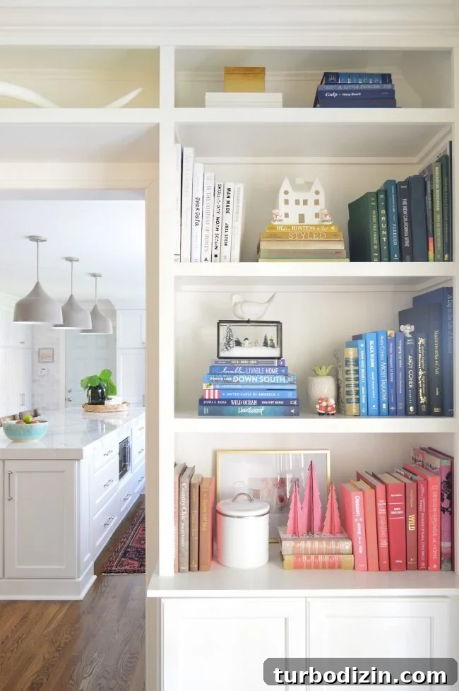 Holiday Home Tour: See Our Christmas Decorating Ideas 5 Bookcase with holiday items