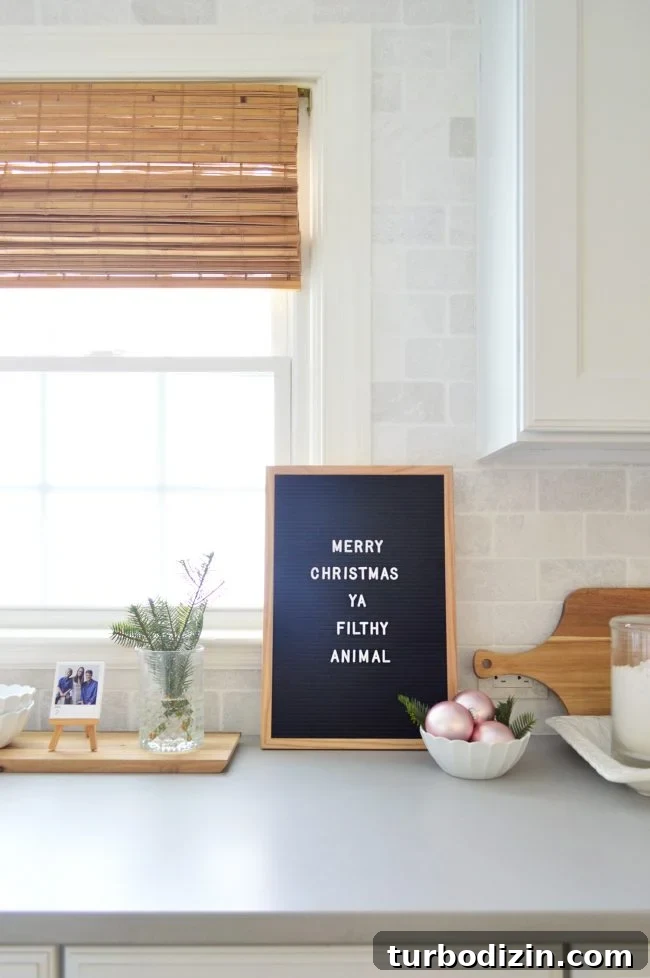 Holiday Home Tour: See Our Christmas Decorating Ideas 7 Kitchen with letterboard