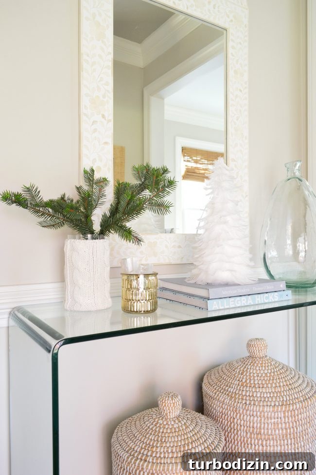 Holiday Home Tour: See Our Christmas Decorating Ideas 8 Foyer with feather tree
