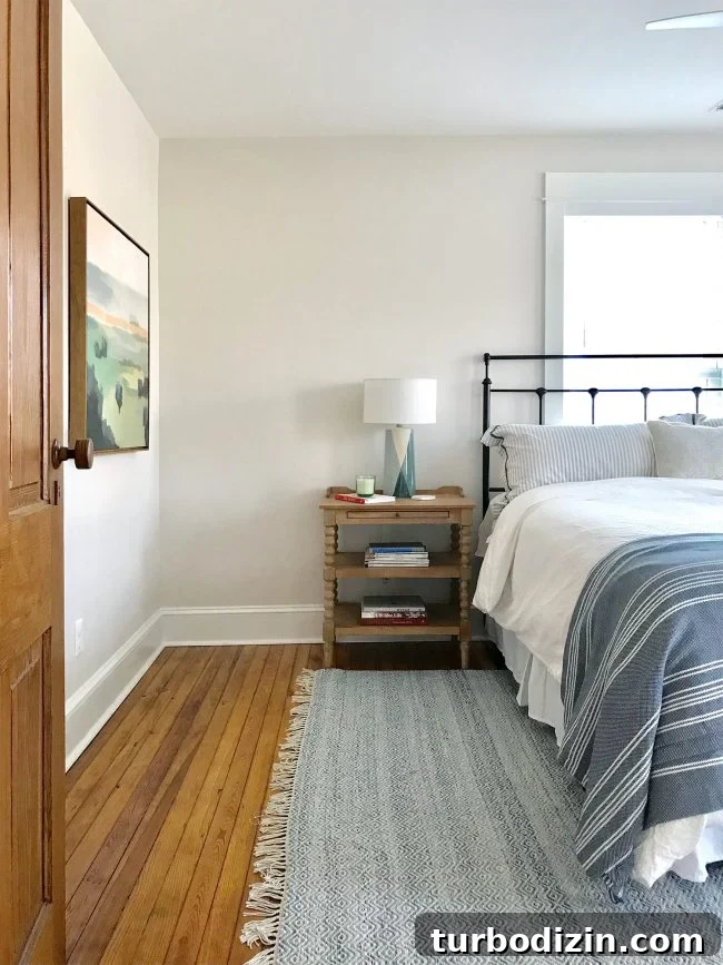 Bedroom with art and rug