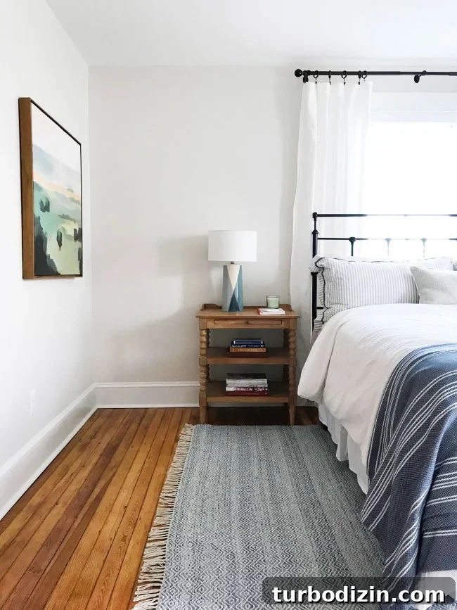 Repairing Cracked or Broken Inlay Furniture: Step-by-Step Guide 12 metal headboard in beachy blue bedroom with pine floors