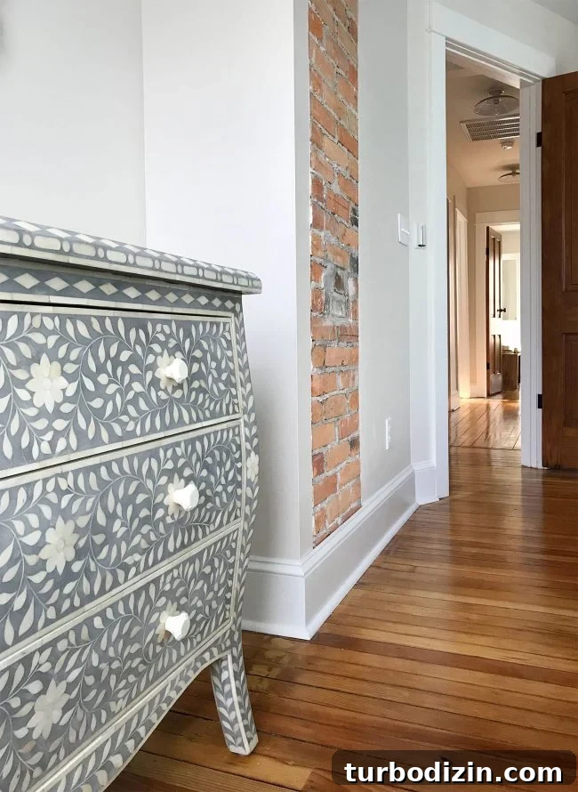 Repairing Cracked or Broken Inlay Furniture: Step-by-Step Guide 4 blue gray inlay detail next to exposed brick