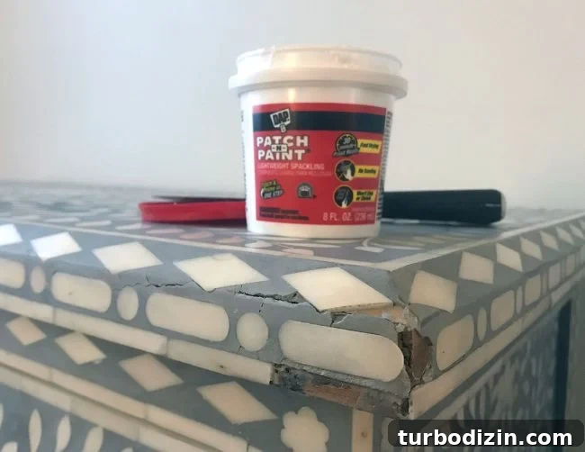 Repairing Cracked or Broken Inlay Furniture: Step-by-Step Guide 5 repair inlay on broken and cracked dresser with spackle
