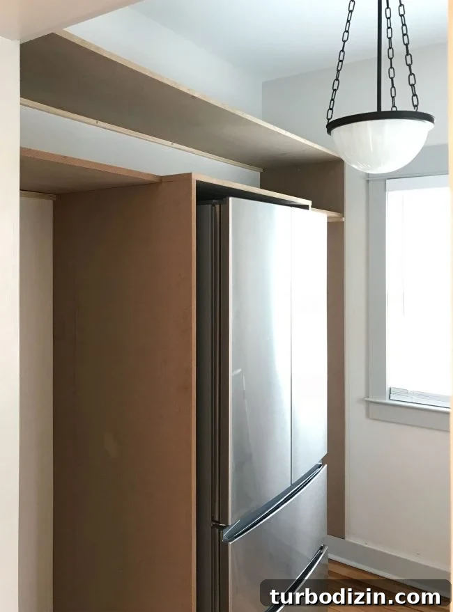 Build Custom Pantry Shelves: Step-by-Step Guide for Any Kitchen 9 two long horizontal pantry shelves added on top of vertical pieces