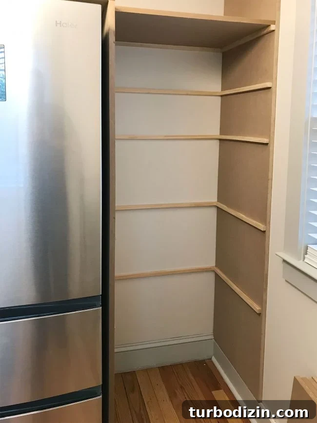 Build Custom Pantry Shelves: Step-by-Step Guide for Any Kitchen 11 thin brace pieces added where pantry shelves will rest