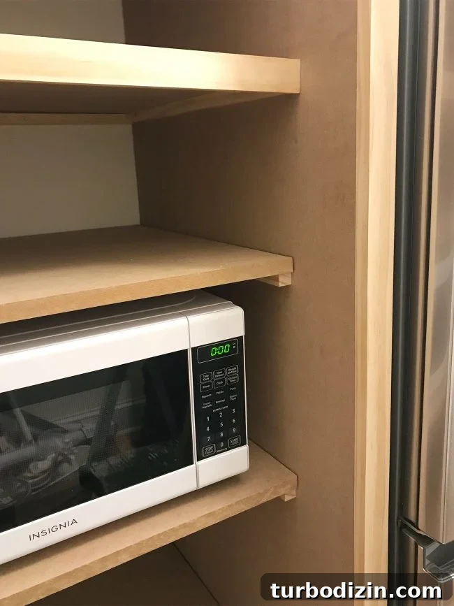 Build Custom Pantry Shelves: Step-by-Step Guide for Any Kitchen 12 1x2 wood pieces attached to front of shelves to make them look thicker