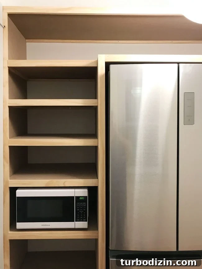 Build Custom Pantry Shelves: Step-by-Step Guide for Any Kitchen 13 left side of built in pantry shelving with all face pieces installed