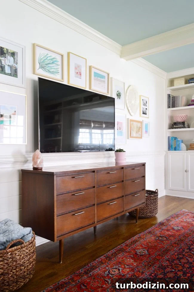 white picture frame gallery white with mounted TV