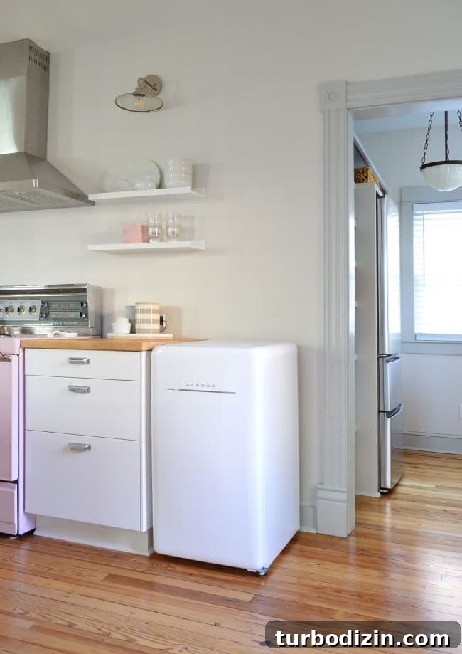 Mini fridge near pantry