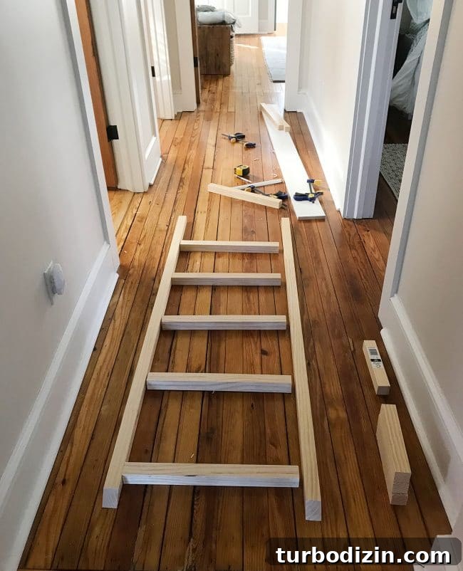 DIY Guide: Building Custom Built-In Bunk Beds for Your Home 17 bunk bed ladder pieces laid out in hallway for construction