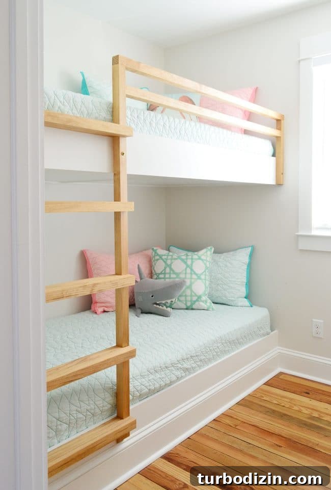 DIY Guide: Building Custom Built-In Bunk Beds for Your Home 26 diy built in beds with raw wood railing and ladder in a small room
