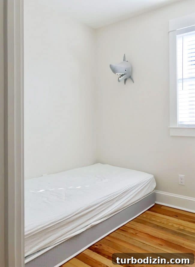 DIY Guide: Building Custom Built-In Bunk Beds for Your Home 5 before shot of mattress on floor in bunk room