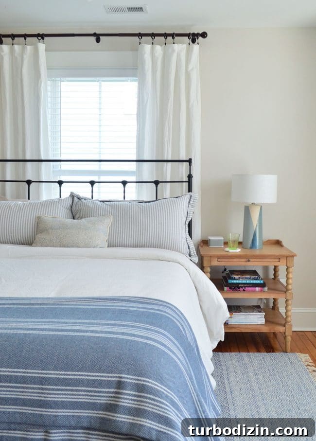 Updated Beach House Tour: Modern Coastal Interior Walkthrough 9 Front bedroom