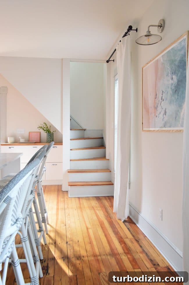 Updated Beach House Tour: Modern Coastal Interior Walkthrough 6 Curtains and stools