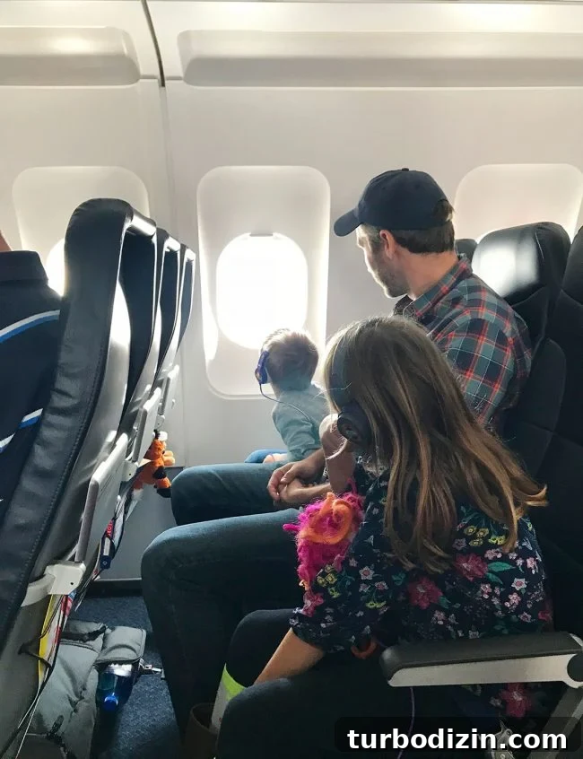 Family Spring Break in Fort Lauderdale: Beaches, Food & Fun Ideas 4 John and kids on plane to spring break in florida