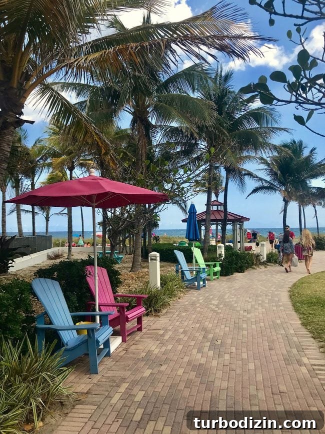 Family Spring Break in Fort Lauderdale: Beaches, Food & Fun Ideas 8 colorful beach chairs and umbrellas at Lauderdale By The Sea Florida