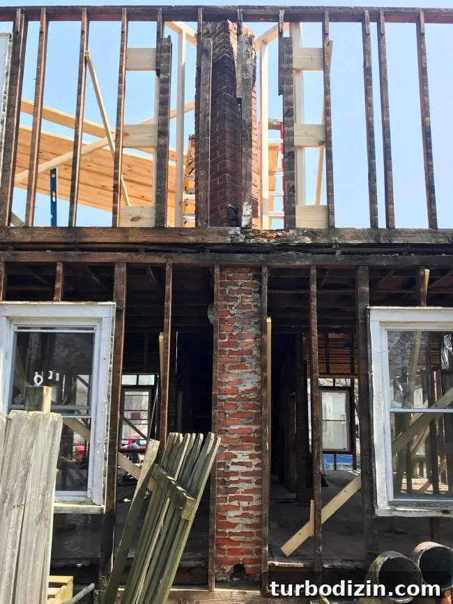 Duplex Drama: What Went Wrong Just When Things Were Going Well 2 Backyard view of duplex chimney