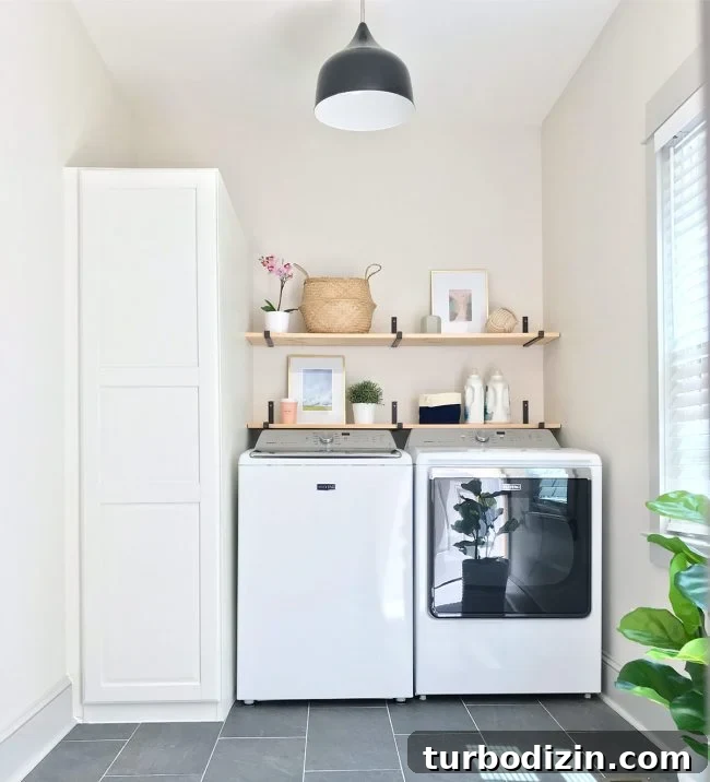 Conceal a Water Heater Using an IKEA Cabinet: Step-by-Step Guide 2 laundry room with top loading washer and ikea storage cabinet with floating shelves