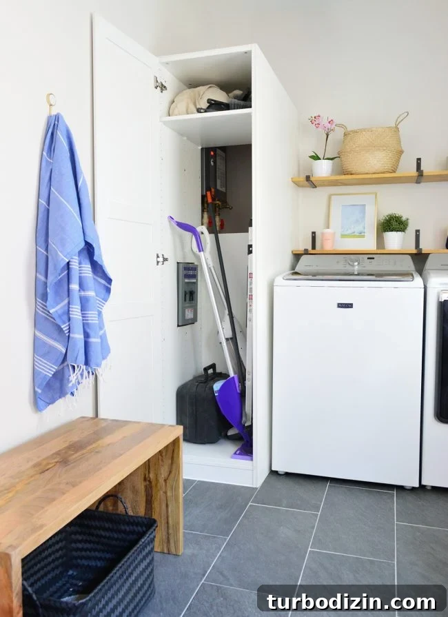 Conceal a Water Heater Using an IKEA Cabinet: Step-by-Step Guide 6 ikea pax wardrobe used for laundry storage cabinet open with access to water heater
