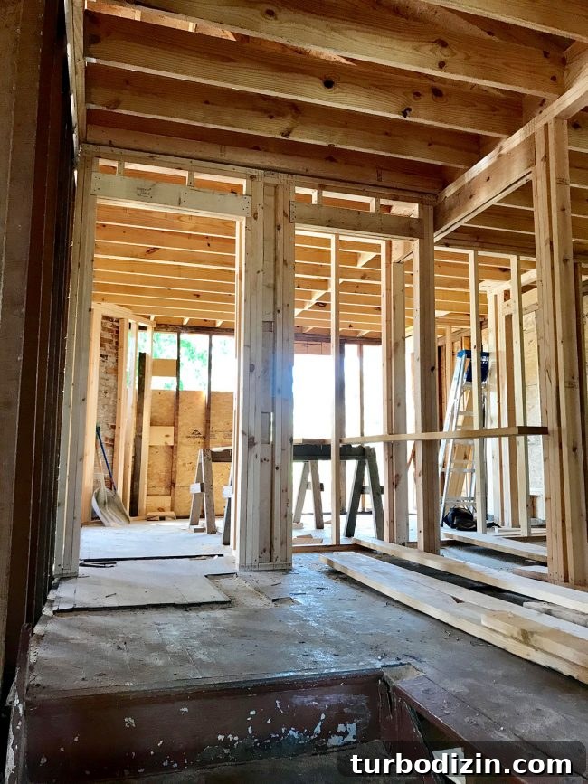 Duplex Renovation Complete: Fast Restoration of a Historic Home 11 Expanded upstairs landing